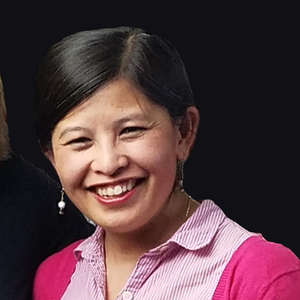 Oanh Bui's headshot, showing a smiling Vietnamese woman wearing a pink collared shirt and her black hair pulled back